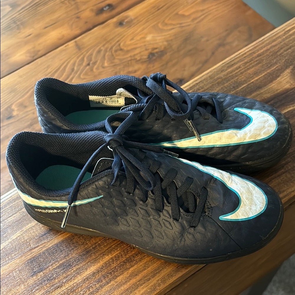 Nike Black and Teal hypervenom youth turf shoes